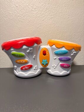 Fat Brain Musical Toy bingo drums- works. And lights up to the beat-Like new
